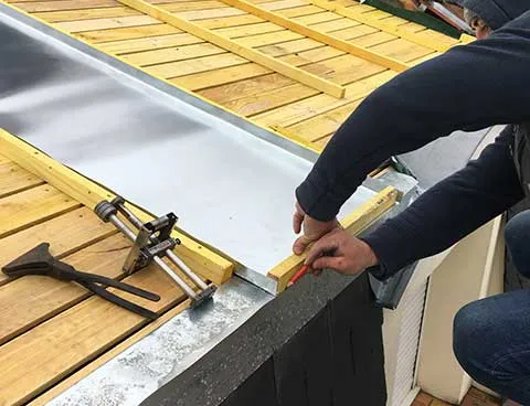 Rénovation complète de toiture par un couvreur à Grenoble