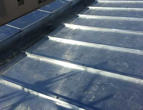 Travaux de zinguerie sur mesure pour toiture à Grenoble